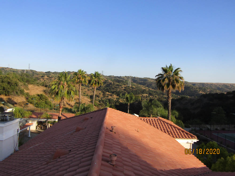 Roof Cleaning Large Terra Cotta Roof Tile After